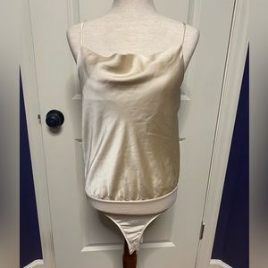 Lulus cream colored bodysuit size medium, spaghetti straps with loose collar